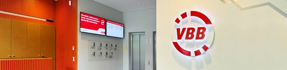 Eingangsbereich des VBB mit Logo an der Wand.